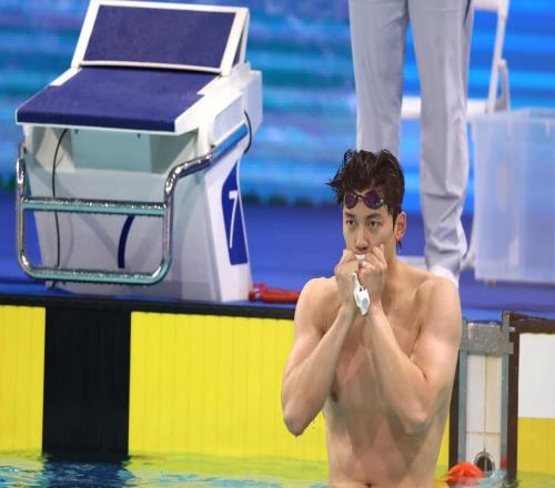 镜头内外｜ “过山车” 式夺冠与泳池老兵的坚守